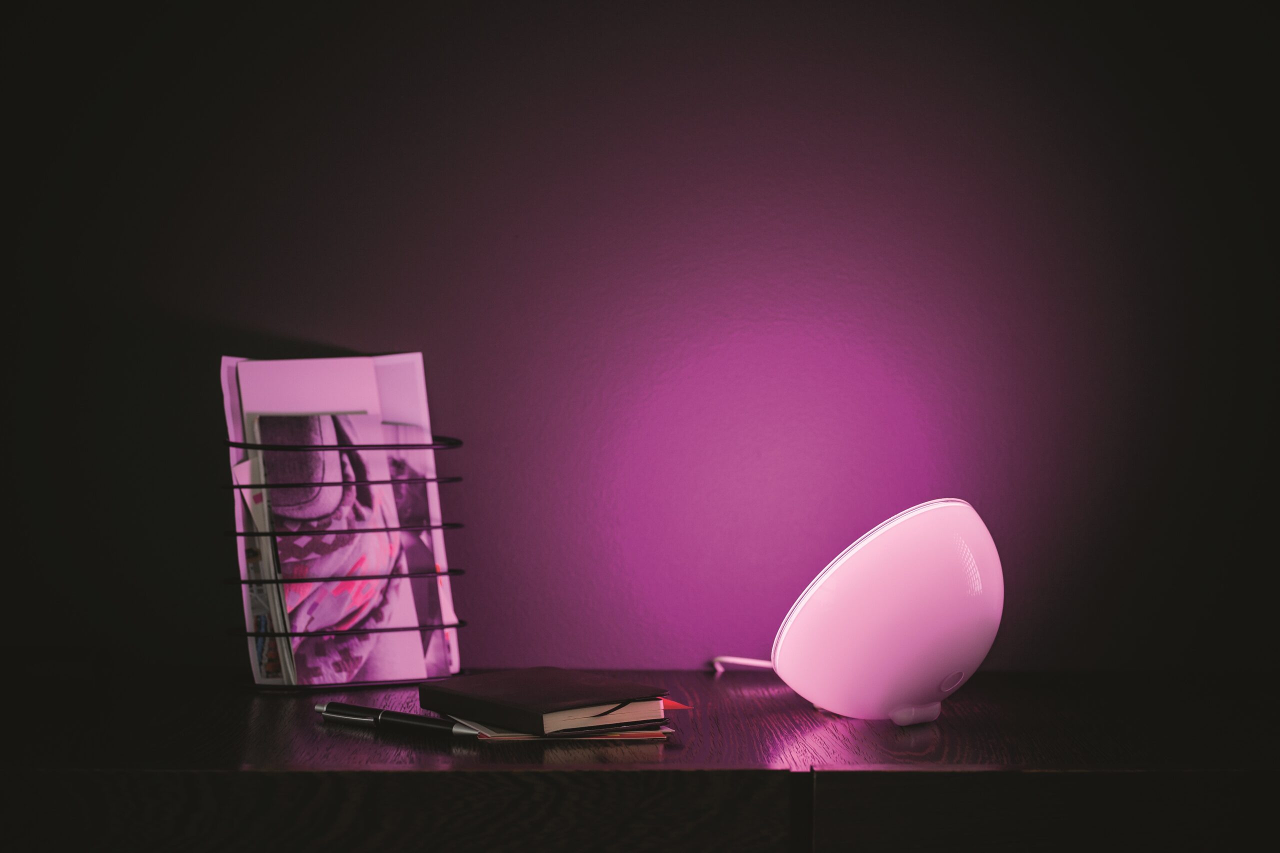 Hue Go facing left with surroundings purple scaled